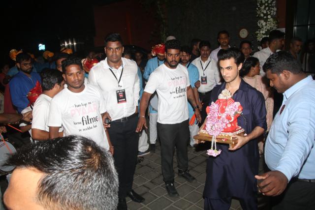 Aayush Sharma carries Ganpati for visarjan.