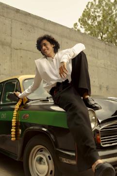 Tuhir’s uncle, Harshad, is a London-based stylist and producer. His stories fascinated him enough to spark an interest in fashion. On him: Shirt and trousers, Rajesh Pratap Singh; shoes, Clarks (Dolly Devi) Tuhir’s uncle, Harshad, is a London-based stylist and producer. His stories fascinated him enough to spark an interest in fashion. On him: Shirt and trousers, Rajesh Pratap Singh; shoes, Clarks (Dolly Devi)