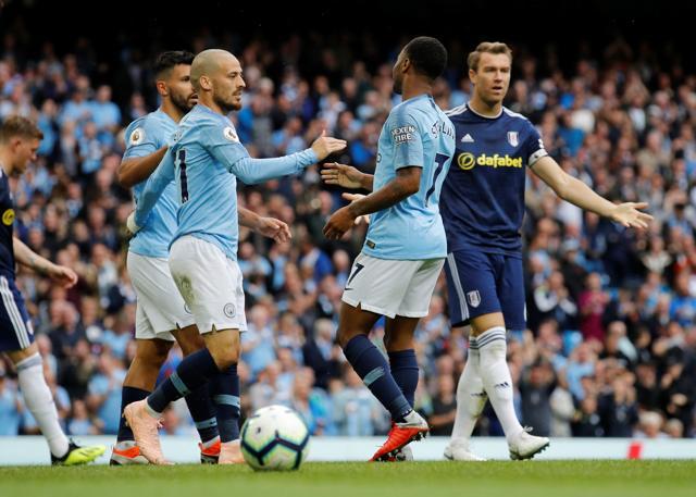 Manchester City's Raheem Sterling celebrates scoring their third goal with David Silva and Sergio Aguero. (REUTERS) Manchester City's Raheem Sterling celebrates scoring their third goal with David Silva and Sergio Aguero. (REUTERS)