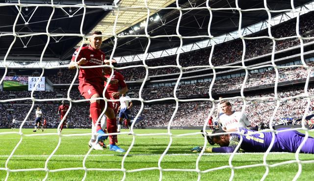 Liverpool's Roberto Firmino scores their second goal. (REUTERS) Liverpool's Roberto Firmino scores their second goal. (REUTERS)