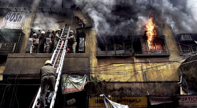 Firefighters try to douse a fire that broke out in a multi-storied wholesale Bagree market, at Burrabazar in Kolkata, Sunday, Sept 16, 2018. (PTI) Firefighters try to douse a fire that broke out in a multi-storied wholesale Bagree market, at Burrabazar in Kolkata, Sunday, Sept 16, 2018. (PTI)