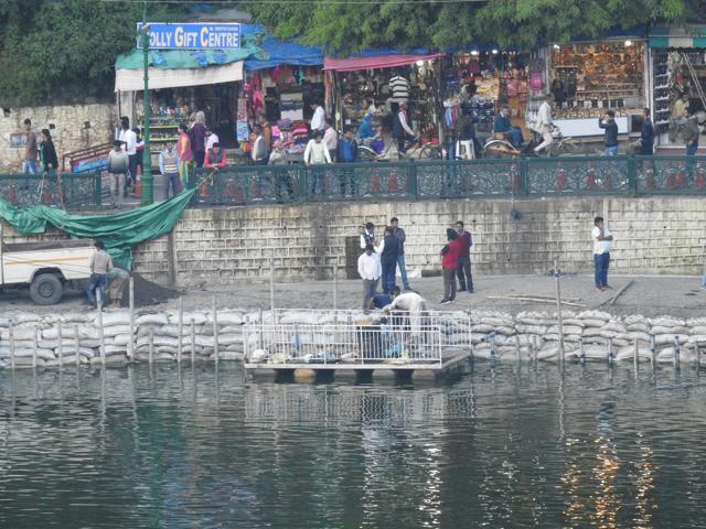 Repair work being done at Lower Mall Road, Nainital. (HT Photo )