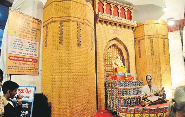 A total of 75,000 biscuits and 8000 chocolates have been used to recreate Shaniwar wada at Grahak peth. (Ravindra Joshi/HT PHOTO)