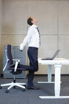 Try and do stretch exercises on your desk at work (Shutterstock) Try and do stretch exercises on your desk at work (Shutterstock)