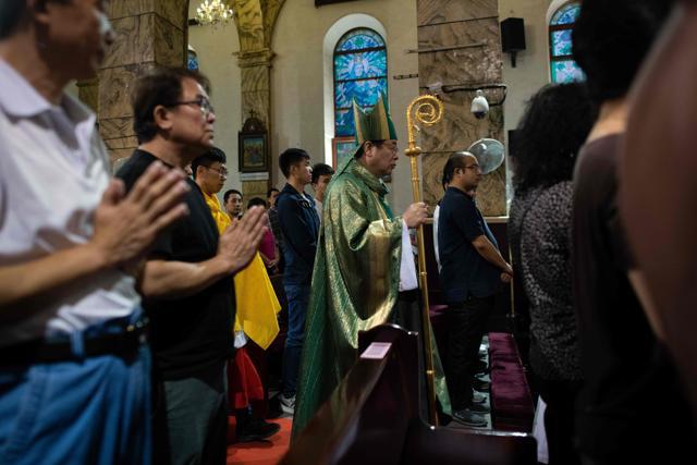 People pray during a mass at the South Cathedral in Beijing on September 22, 2018. (AFP) People pray during a mass at the South Cathedral in Beijing on September 22, 2018. (AFP)
