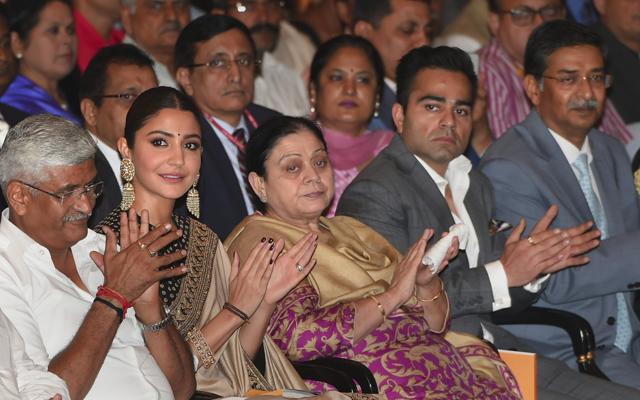 Anushka Sharma cheering for Virat Kohli as he was honoured with Rajiv Gandhi Khel Ratna, at Rashtrapati Bhawan in New Delhi. (AP) Anushka Sharma cheering for Virat Kohli as he was honoured with Rajiv Gandhi Khel Ratna, at Rashtrapati Bhawan in New Delhi. (AP)