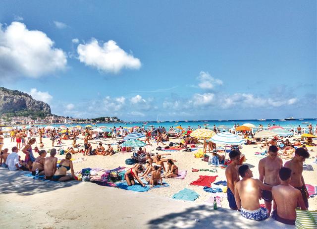 Youngsters gather around worshiping Sun & Sea at Mondello Beach Palermo (Pranay Baidya) Youngsters gather around worshiping Sun & Sea at Mondello Beach Palermo (Pranay Baidya)