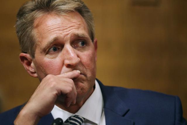 Senate Judiciary Committee Senator Jeff Flake listens to fellow committee members debate the confirmation of Supreme Court nominee Judge Brett Kavanaugh during a mark up hearing in the Dirksen Senate Office Building on Capitol Hill. (AFP Photo) Senate Judiciary Committee Senator Jeff Flake listens to fellow committee members debate the confirmation of Supreme Court nominee Judge Brett Kavanaugh during a mark up hearing in the Dirksen Senate Office Building on Capitol Hill. (AFP Photo)