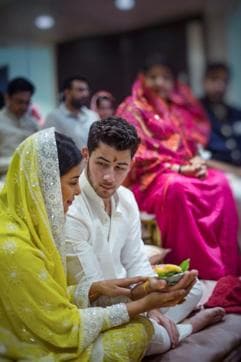 Priyanka Chopra and American singer Nick Jonas during the roka rituals at her Juhu residence in Mumbai in August this year. (PTI) Priyanka Chopra and American singer Nick Jonas during the roka rituals at her Juhu residence in Mumbai in August this year. (PTI)
