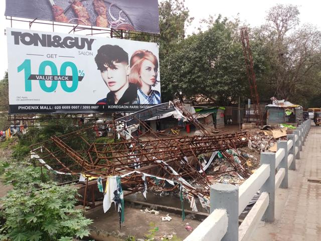On October 3, two billboards collapsed in Kalyaninagar because of heavy rainfallduring the night. No one was injured as the incident happened at night and the road was deserted. (HT PHOTO) On October 3, two billboards collapsed in Kalyaninagar because of heavy rainfallduring the night. No one was injured as the incident happened at night and the road was deserted. (HT PHOTO)