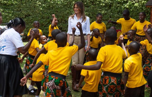 Children dance around US first lady Melania Trump during her visit to Nest Children’s Home Orphanage in Nairobi. (AFP) Children dance around US first lady Melania Trump during her visit to Nest Children’s Home Orphanage in Nairobi. (AFP)
