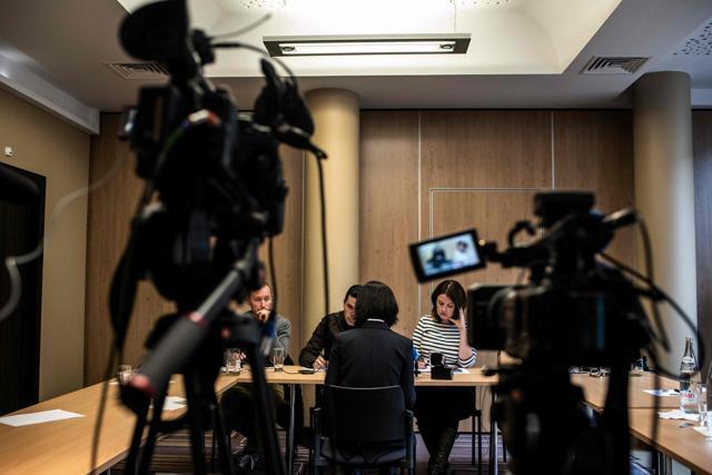 Grace, the wife of the missing Interpol president Meng Hongwey, talks to journalists on October 7, 2018 in Lyon during a press conference during which she did not want her face to be shown, a day after Interpol demanded an official "clarification" from China on the whereabouts of its missing police chief. (AFP Photo) Grace, the wife of the missing Interpol president Meng Hongwey, talks to journalists on October 7, 2018 in Lyon during a press conference during which she did not want her face to be shown, a day after Interpol demanded an official "clarification" from China on the whereabouts of its missing police chief. (AFP Photo)
