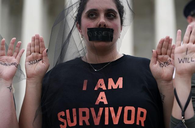 Activists occupy the front steps of the US Supreme Court to protest against the confirmation of Brett Kavanaugh. (AFP) Activists occupy the front steps of the US Supreme Court to protest against the confirmation of Brett Kavanaugh. (AFP)