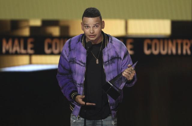 Kane Brown with his trophy. (AP) Kane Brown with his trophy. (AP)