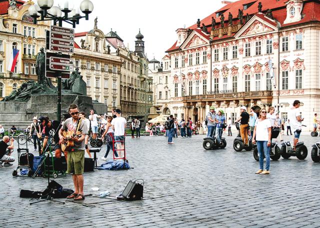 Old Town Square in Prague is dotted with cafés, always bustling with magicians and locals (Surbhee Grover) Old Town Square in Prague is dotted with cafés, always bustling with magicians and locals (Surbhee Grover)