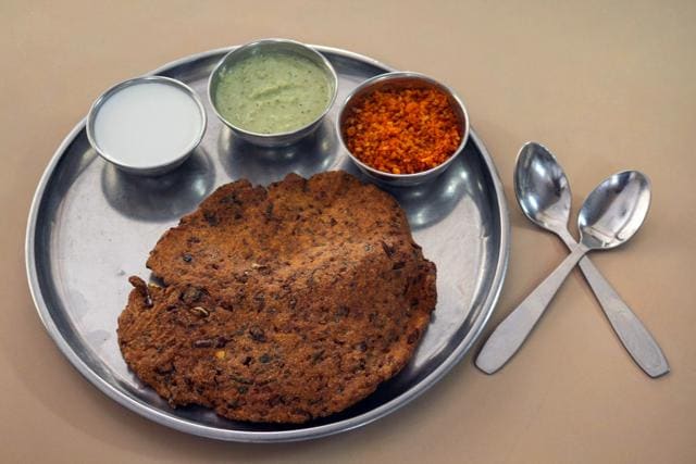Navratri food in Maharashtra is mainly vegetarian. People love thalipeeth made with a batter of soaked sabudana, water chestnut, raw banana with green chillies and coriander, and fried. (Praful Gangurde/ HT Photo) Navratri food in Maharashtra is mainly vegetarian. People love thalipeeth made with a batter of soaked sabudana, water chestnut, raw banana with green chillies and coriander, and fried. (Praful Gangurde/ HT Photo)
