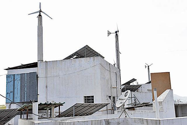Windmills were set up as an alternate energy source for the residents of the society. (HT PHOTO) Windmills were set up as an alternate energy source for the residents of the society. (HT PHOTO)