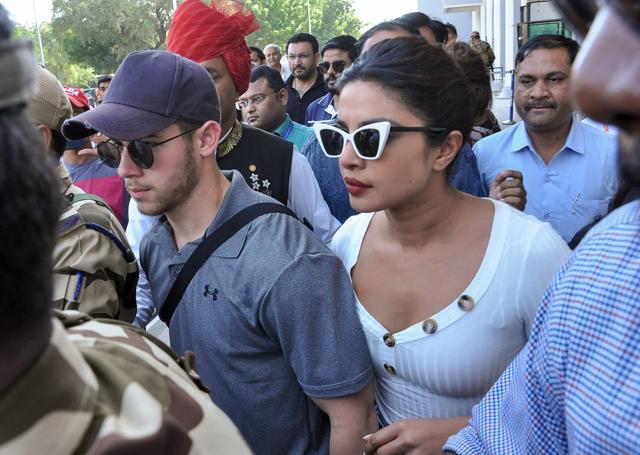 Bollywood actor Priyanka Chopra and American singer Nick Jonas leave from Jodhpur airport. (PTI) Bollywood actor Priyanka Chopra and American singer Nick Jonas leave from Jodhpur airport. (PTI)