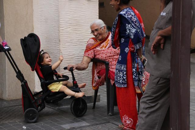Such a joy! Inaaya interacts with an elderly lady. Such a joy! Inaaya interacts with an elderly lady.