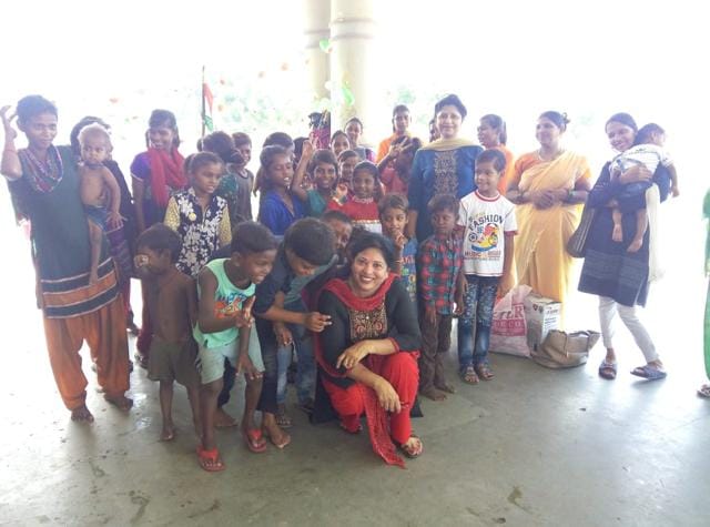 Pearly Lall(centre seated) with the slum children of Sadar. (HT) Pearly Lall(centre seated) with the slum children of Sadar. (HT)