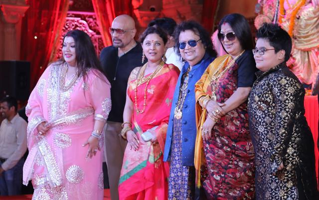 Bappi Lahiri and Sharbani Mukherji at Durga puja celebration in Mumbai. Bappi Lahiri and Sharbani Mukherji at Durga puja celebration in Mumbai.