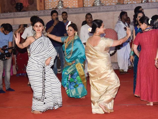 Mouni Roy dances at a Durga Puja pandal during the celebrations. (IANS) Mouni Roy dances at a Durga Puja pandal during the celebrations. (IANS)