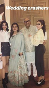 Janhvi Kapoor and Khushi Kapoor with father Boney and a relative.