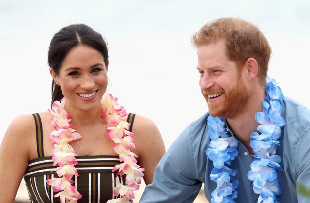 Prince Harry, Duke of Sussex and Meghan, Duchess of Sussex talk to members of OneWave, an awareness group for mental health and wellbeing at South Bondi Beach. (REUTERS)