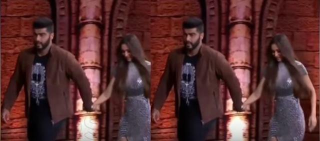 Arjun and Malaika walked hand in hand to the stage.