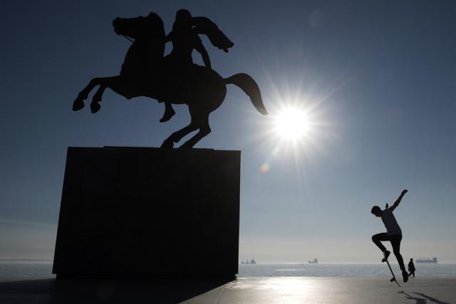 A skateboarder practices next to the modern bronze statue of Alexander the Great on his famous horse Bucephalus in the northern port city of Thessaloniki , Greece. (AP) A skateboarder practices next to the modern bronze statue of Alexander the Great on his famous horse Bucephalus in the northern port city of Thessaloniki , Greece. (AP)