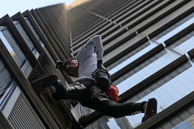 “This is what I love to do,” Alain Robert had told a handful of reporters at a nearby hotel shortly before beginning his ascent. (AFP) “This is what I love to do,” Alain Robert had told a handful of reporters at a nearby hotel shortly before beginning his ascent. (AFP)