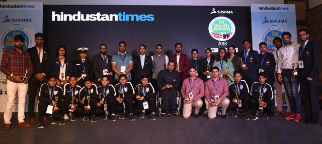 From left (standing): Wushu champ Narender Garewal, rower Sukhmeet Singh, shooter Manu Bhaker, INS Tarini crew Lt Payal Gupta, Kashmir Administrative Service officer Anjum Bashir Khan Khattak, martial arts coach Faisal Ali Dar, chief guest and Olympic gold medallist Abhinav Bindra, cricketer Siddharth Kaul, printmaking artist Rahul Dhiman, artist Ashima Raizada, hockey player Navneet Kaur, Panjab University student council president Kanupriya, designer Seerat Virdi, skier Jagdish Rawat, para shooter Manish Narwal, poet Harmanjeet Singh and athlete Manjit Singh Chahal (extreme right). Seated from left: Under-16 Indian football players Varsha, Manisha, Anju, Poonam, Kavita, Nisha; and para athlete Amit Balyan, shooters and twins Udayveer and Vijayveer; and rising football players Kiran and Ritu. (Sanjeev Sharma/HT) From left (standing): Wushu champ Narender Garewal, rower Sukhmeet Singh, shooter Manu Bhaker, INS Tarini crew Lt Payal Gupta, Kashmir Administrative Service officer Anjum Bashir Khan Khattak, martial arts coach Faisal Ali Dar, chief guest and Olympic gold medallist Abhinav Bindra, cricketer Siddharth Kaul, printmaking artist Rahul Dhiman, artist Ashima Raizada, hockey player Navneet Kaur, Panjab University student council president Kanupriya, designer Seerat Virdi, skier Jagdish Rawat, para shooter Manish Narwal, poet Harmanjeet Singh and athlete Manjit Singh Chahal (extreme right). Seated from left: Under-16 Indian football players Varsha, Manisha, Anju, Poonam, Kavita, Nisha; and para athlete Amit Balyan, shooters and twins Udayveer and Vijayveer; and rising football players Kiran and Ritu. (Sanjeev Sharma/HT)
