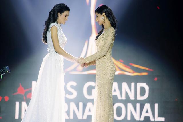 Miss Grand International finalists, Clara Sosa of Paraguay (L) holds hands with Meenakshi Chaudhary of India before the winner was announced. (Miss Grand International/AP) Miss Grand International finalists, Clara Sosa of Paraguay (L) holds hands with Meenakshi Chaudhary of India before the winner was announced. (Miss Grand International/AP)