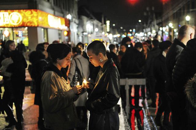 Two people hold candles during an interfaith vigil outside of Sixth Presbyterian Church, Saturday, Oct, 27, 2018, in the Squirrel Hill section of Pittsburgh. (AP) Two people hold candles during an interfaith vigil outside of Sixth Presbyterian Church, Saturday, Oct, 27, 2018, in the Squirrel Hill section of Pittsburgh. (AP)