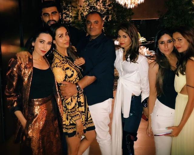 Malaika Arora and Arjun Kapoor with friends. Malaika Arora and Arjun Kapoor with friends.
