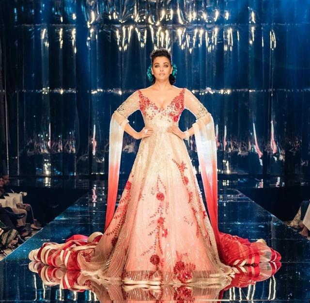 Aishwarya Rai Bachchan walks on ramp for showcasing the creation of fashion designer Manish Malhotra. (IANS) Aishwarya Rai Bachchan walks on ramp for showcasing the creation of fashion designer Manish Malhotra. (IANS)
