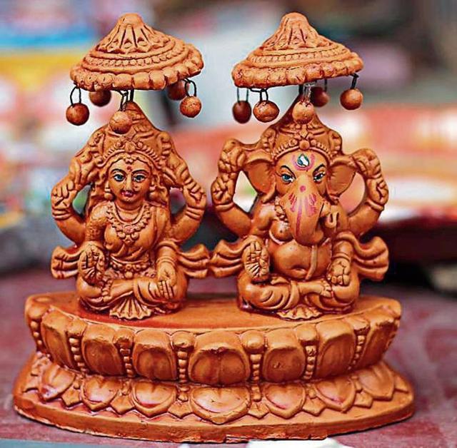 A Lakshmi-Ganesh idol pair is priced at
₹60 (Shivam Saxena/HT) A Lakshmi-Ganesh idol pair is priced at
₹60 (Shivam Saxena/HT)
