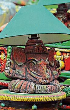 This Ganesh earthen lamp can also be used as a candle stand. It is priced at
₹250 per price (Shivam Saxena/HT) This Ganesh earthen lamp can also be used as a candle stand. It is priced at
₹250 per price (Shivam Saxena/HT)
