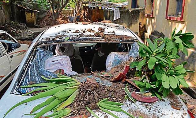 The damaged car of a senior police officer at Police Lines, Patna. (HT Photo)