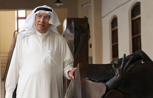 Kuwaiti sculptor Sami Mohammed poses next to one of his works at the Museum of Modern Art in Kuwait City. (AFP) Kuwaiti sculptor Sami Mohammed poses next to one of his works at the Museum of Modern Art in Kuwait City. (AFP)