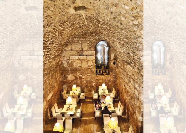 Stop for a bite at Between the Arches restaurant built in a cavern just off the Wailing Wall (Siddhartth Mahajan ) Stop for a bite at Between the Arches restaurant built in a cavern just off the Wailing Wall (Siddhartth Mahajan )