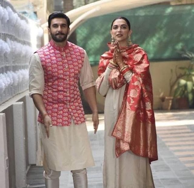 Ranveer Singh and Deepika Padukone wave to paparazzi in Mumbai.