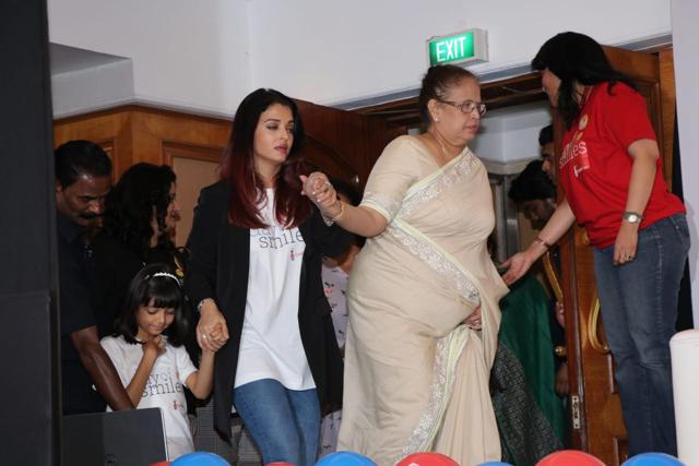 Three generations of the Rai family walk up to the stage. Three generations of the Rai family walk up to the stage.