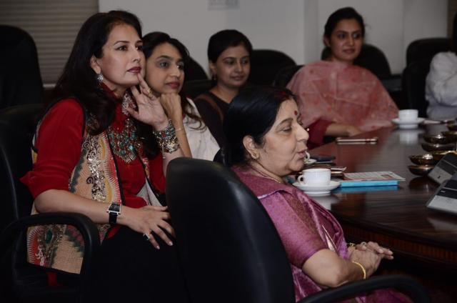 Ritu Beri (in red) and Sushma Swaraj at the meeting.