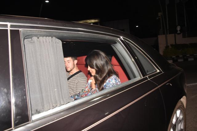Nick Jonas and Priyanka Chopra leave Mumbai airport on arrival.