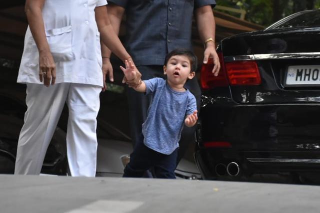 Taimur Ali Khan tries to interact with the media. (Viral Bhayani) Taimur Ali Khan tries to interact with the media. (Viral Bhayani)