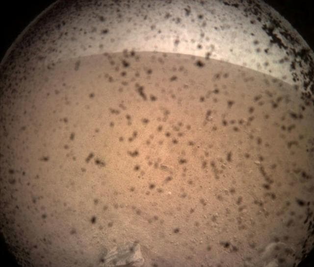 InSight acquired this image of the surface of Mars. This was the area in front of the lander. (Reuters) InSight acquired this image of the surface of Mars. This was the area in front of the lander. (Reuters)
