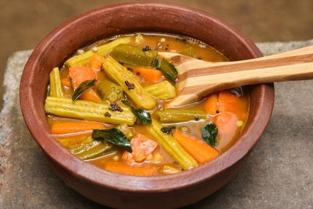 The meal-time sambhar is thicker and has many more vegetables than the tiffin sambhar, which has only drumsticks (Sbutterstock) The meal-time sambhar is thicker and has many more vegetables than the tiffin sambhar, which has only drumsticks (Sbutterstock)