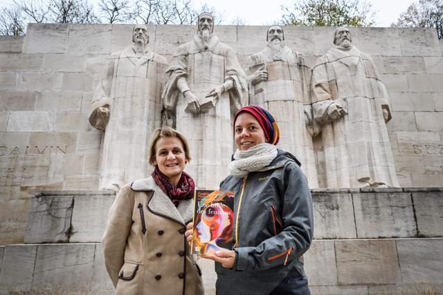 Geneva theology professors Elisabeth Parmentier (L) and Lauriane Savoy pose under the reformation wall with a edition of "A Women's Bible." (AFP) Geneva theology professors Elisabeth Parmentier (L) and Lauriane Savoy pose under the reformation wall with a edition of "A Women's Bible." (AFP)
