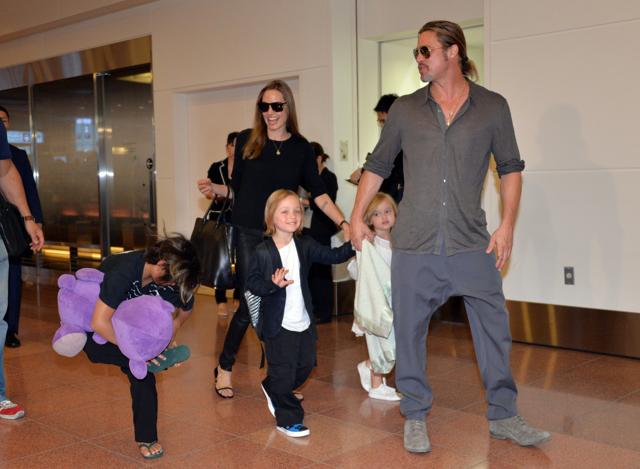 In this file photo taken on July 28, 2013, Brad Pitt (R) and Angelina Jolie (C), accompanied by their children, arrive at Haneda International Airport in Tokyo. (AFP) (AFP) In this file photo taken on July 28, 2013, Brad Pitt (R) and Angelina Jolie (C), accompanied by their children, arrive at Haneda International Airport in Tokyo. (AFP) (AFP)